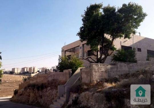 قطعة أرض في ضاحية الرشيد مرتفعه و مطله للبيع 