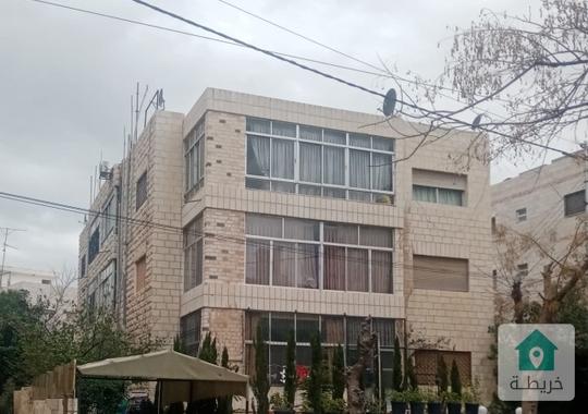 بناية للبيع في جبل الحسين قرب دوار الداخلية 
