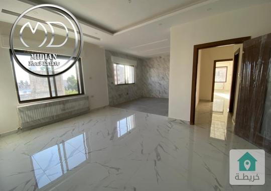 شقة ارضية جديدة ضاحية النخيل مساحة 250م مع ترس70 م تشطيب فاخر