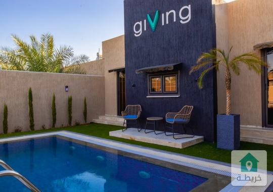 تملك شاليه 5 نجوم ضمن كمباوند giving بالقرب من المطار الارض 350 متر البناء 70 متر