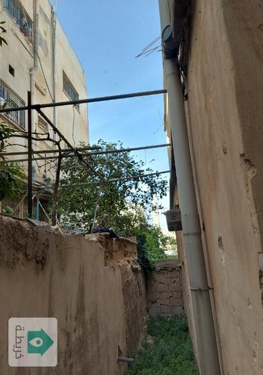 منزل مكون من طابقين للبيع 