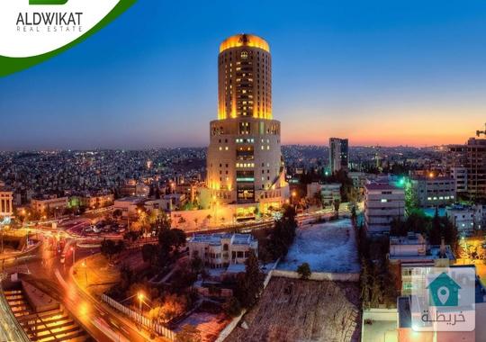 ارض تجارية للبيع قرب الدوار الخامس بمساحة 2058 م