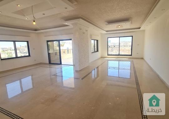شقة طابقية ٣٥٠م للبيع في أجمل مواقع ضاحية الرشيد ٤نوم و٤ بلاكين واسعة مطلة بسعر مغري 