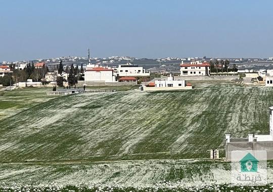 قطعة ارض على شارعين في اجمل حوض في منجا 