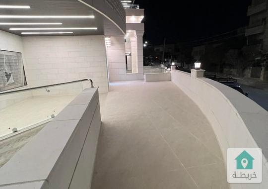 شقه ارضيه فخمه بطبربور خلف عريفه مول مساحه داخلي 209م وخارجي130م للبيع بسعر 105 الاف ت 0796974924