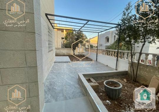 شقة فارغة للإيجار  تلاع العلي  لقطة أرضيه مع ترس وحديقة  مجددة بالكامل لم تسكن من بعد التجديد
