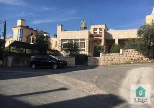 قطعة أرض مميزة في خلدا الجنوبي عليها بناء قديم