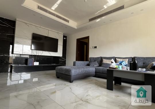 شقة مفروشة طابق ثاني للبيع مطله على طريق المطار و كورديرو عبدون 