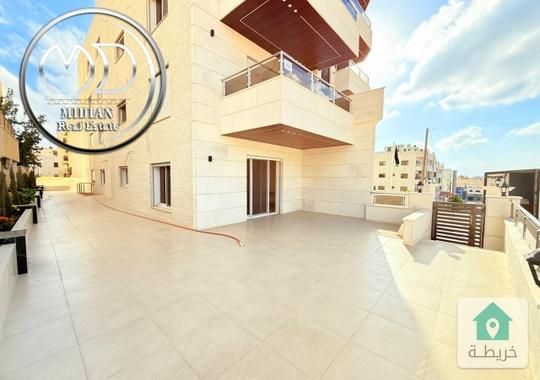 شقة ارضية للبيع خلدا مساحة 180م مع ترس وحديقة 200م تشطيبات ديكورات عصرية فاخرة جديدة لم تسكن