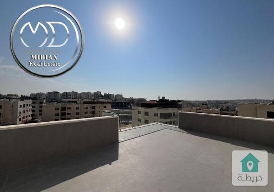 شقة دوبلكس جديدة طابق أخبر مع روف للبيع حي الصحابة مساحة 215م مع تراسات اطلالة رائعة بسعر مميز