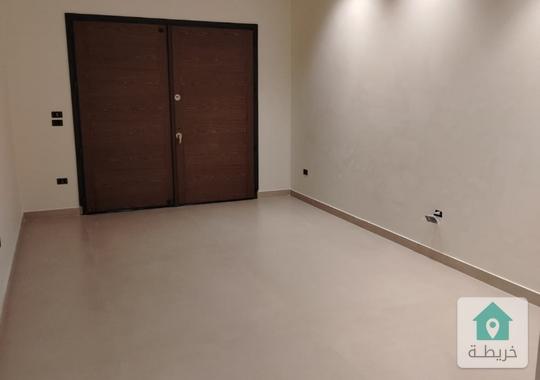 شقة أرضية جديدة للبيع دير غبار 