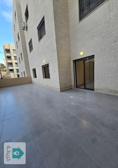 شقة أرضية للبيع في تلاع العلي ١١٥م مع تراسات واسعة جديدة 