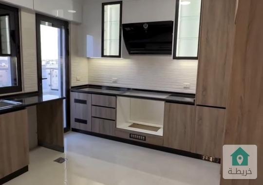 شقة ارضية جديدة بتشطيبات مميزة للبيع في تلاع العلي 