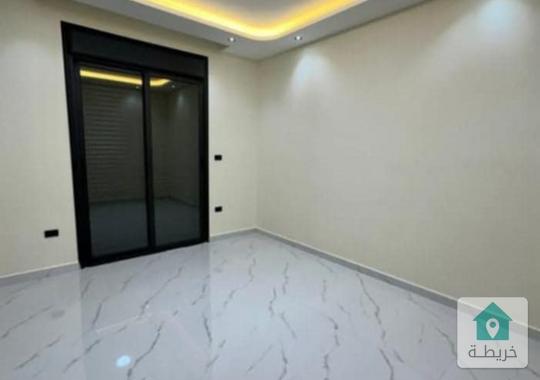 شقة شبه أرضي للبيع طبربور قرب دوار الدبابة 