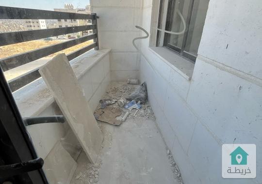 شقة جديدة لقطة في جبل الزهور ب 28 الف من المالك تشطيب حديث