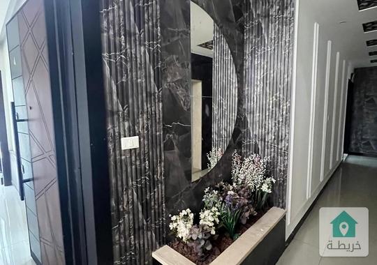 شقة لقطة ب 52 الف في ضاحية الامير علي تشطيب حديث 