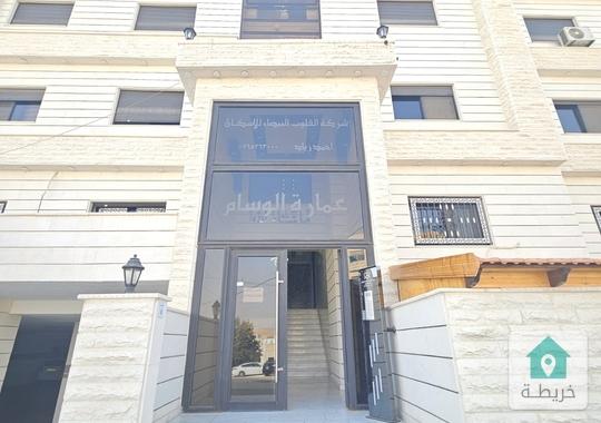 شقه جديده في مبنى جديد في منطقه شفا بدران منطقه الكوم 