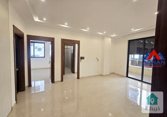 عبدون شقة للإيجار فخمة جديدة لم تسكن مكونه من 2 نوم طابق اول 