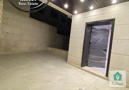 شقة شبه ارضي فارغة للايجار تلاع العلي مساحة 170م مع ترس 80م جديدة لم تسكن بسعر مميز جدا 