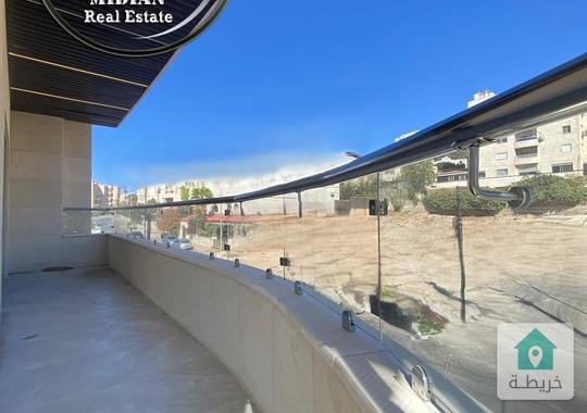 شقة ارضية جديدة فارغة للايجار ضاحية الرشيد مساحة 180م مع ترس 30م تشطيبات ديكورات سوبر ديلوكس 