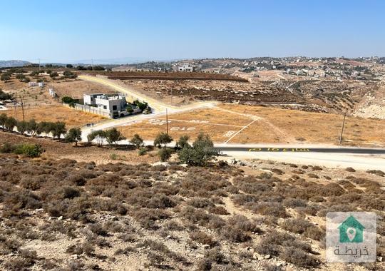 أرض سكن ب على شارعين 10م و 16م  1 كم عن طريق مادبا الغربي ناعور  الروضة  حوض المصدار