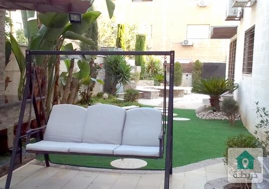 الرابية شقة أرضية مفروشة فخمة مع حديقة كبيرة للإيجار و كراج و مدخل خاص