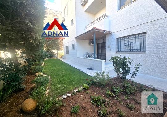 شقة مفروشة ارضية مع حديقة كبيرة للإيجار في الرابية