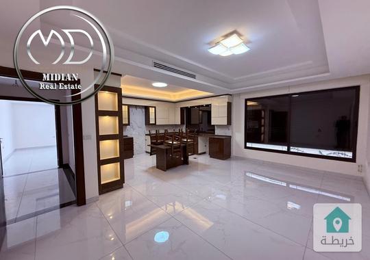 شقة ارضية للبيع دير غبار مساحة 200م مع ترس 35م تشطيبات ديكورات سوبر ديلوكس جديدة لم تسكن  