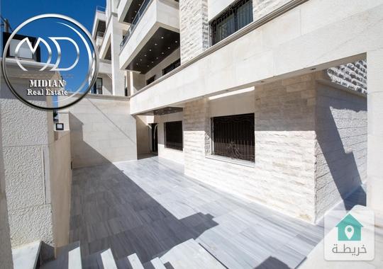 شقة شبه ارضي جديدة للبيع تلاع العلي مساحة 185م مع ترس 50م تشطيبات سوبر ديلوكس بسعر مميز جدا