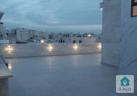 شقة مع  روف دوبلكس درج داخلي  في مرج الحمام بالقرب من دوار البكري 