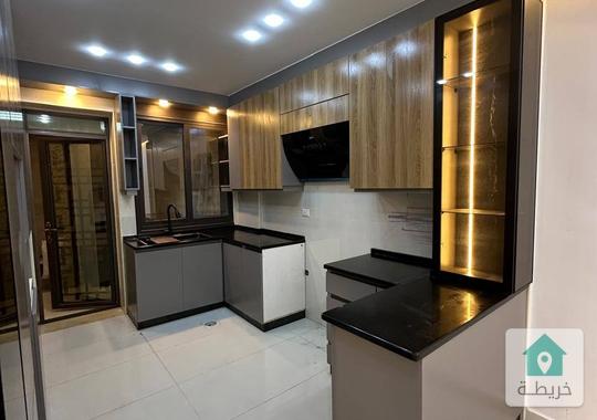 شقة فاخرة للبيع في اجمل مواقع ابو علندا بسعر مغري جدا 49 الف مع مطبخ راكب من المالك 