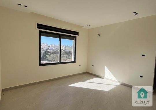 ارضي مع ترس في الذراع الغربي مع مطبخ راكب للبيع