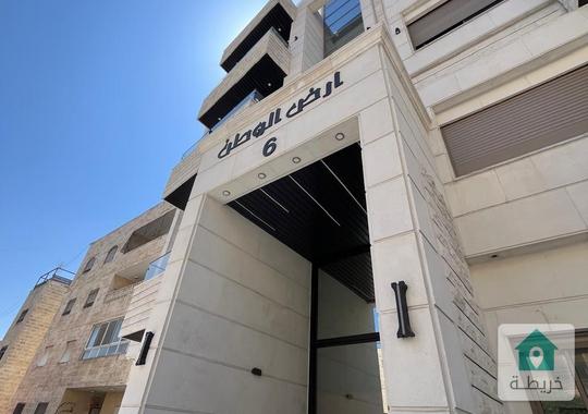 ارضيه مع ترس 100 متر في ضاحية الياسمين قرب حي الصحابة  للبيع 