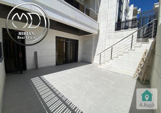 شقة شبه ارضي جديدة للبيع خلدا مساحة 165م مع ترس و حديقة 100م تشطيبات و ديكورات فاخرة بسعر مميز