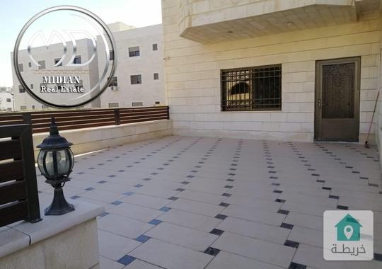 شقة ارضية فارغة للايجار الرابية مساحة 185مع ترس 70م تشطيب سوبر ديلوكس بسعر مميز