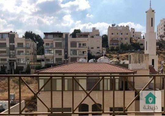 شقة اخير مع روف ضاحية الرشيد قرب مدارس الكلية العلمية الاسلامية 