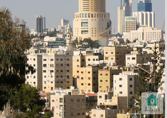 مجمع تجاري في حي نزال للبيع 