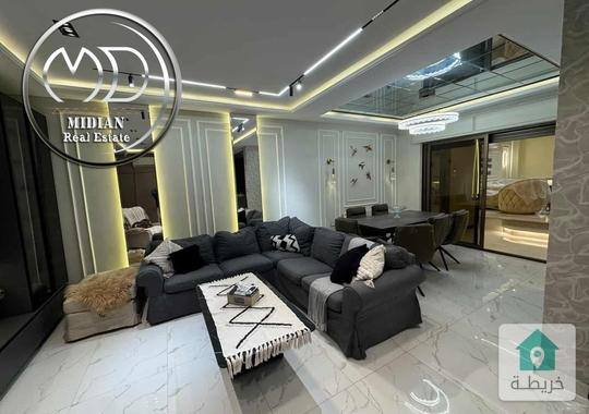 شقة شبه ارضي مفروشة للايجار عبدون مساحة 140م مع ترس و حديقة 130م تشطيبات و ديكورات عصرية فرش فاخر جد