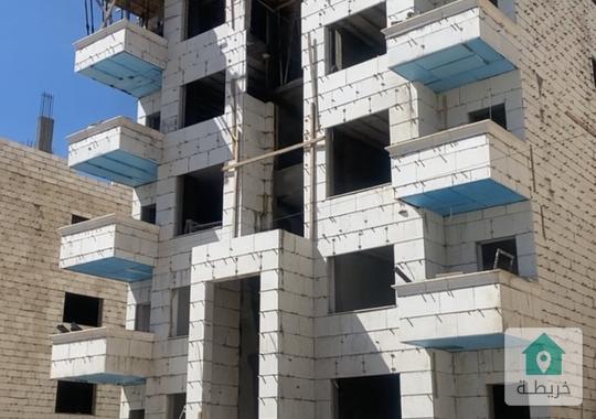 شقة ارضية مع مدخل وكراج مستقل في تلاع العلي مساحة 137 متر 