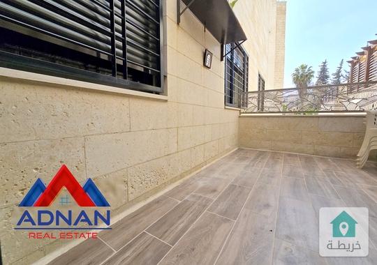 خلدا شقه ارضيه مفروشه للايجار السنوي مع تراس مكونه من 3 نوم