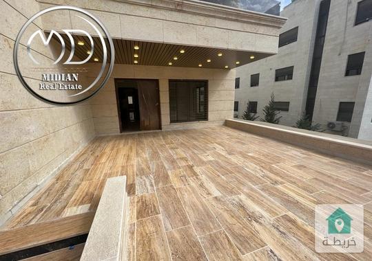 شقة أرضية جديدة للبيع خلدا العوجانية مساحة 200م مع ترس و حديقة 150م تشطيبات ديكورات عصرية فاخرة بسعر