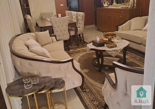 شقه للبيع في حي الروابي موازي لشارع عبدالله غوشه طابق ارضي مع ترس ومدخل وموقف سيارة مستقل 