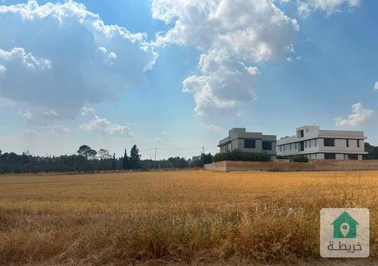 ارض للبيع في منطقة منجا - طريق المطار 