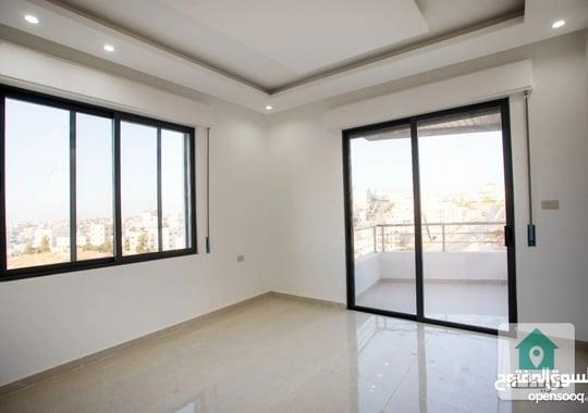 شقة مميزة طابق ثالث مساحة 111متر مع روف51 متر  في جنوب عمان ابوعلندا دوار البنزين مشروع BO30 